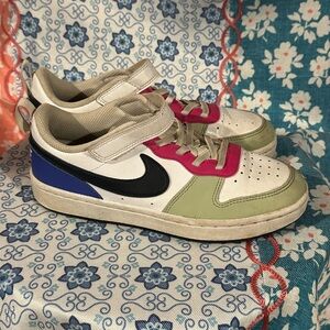 Nike Kids Sneakers with Pink, Green, and Blue Accents